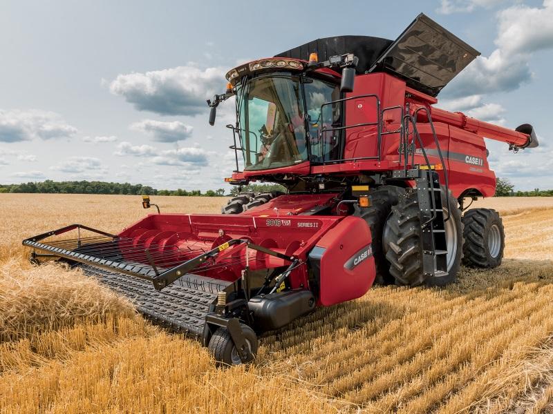 A red 2019 Case IH Axial-Flow® 240 Series Combine harvesting wheat